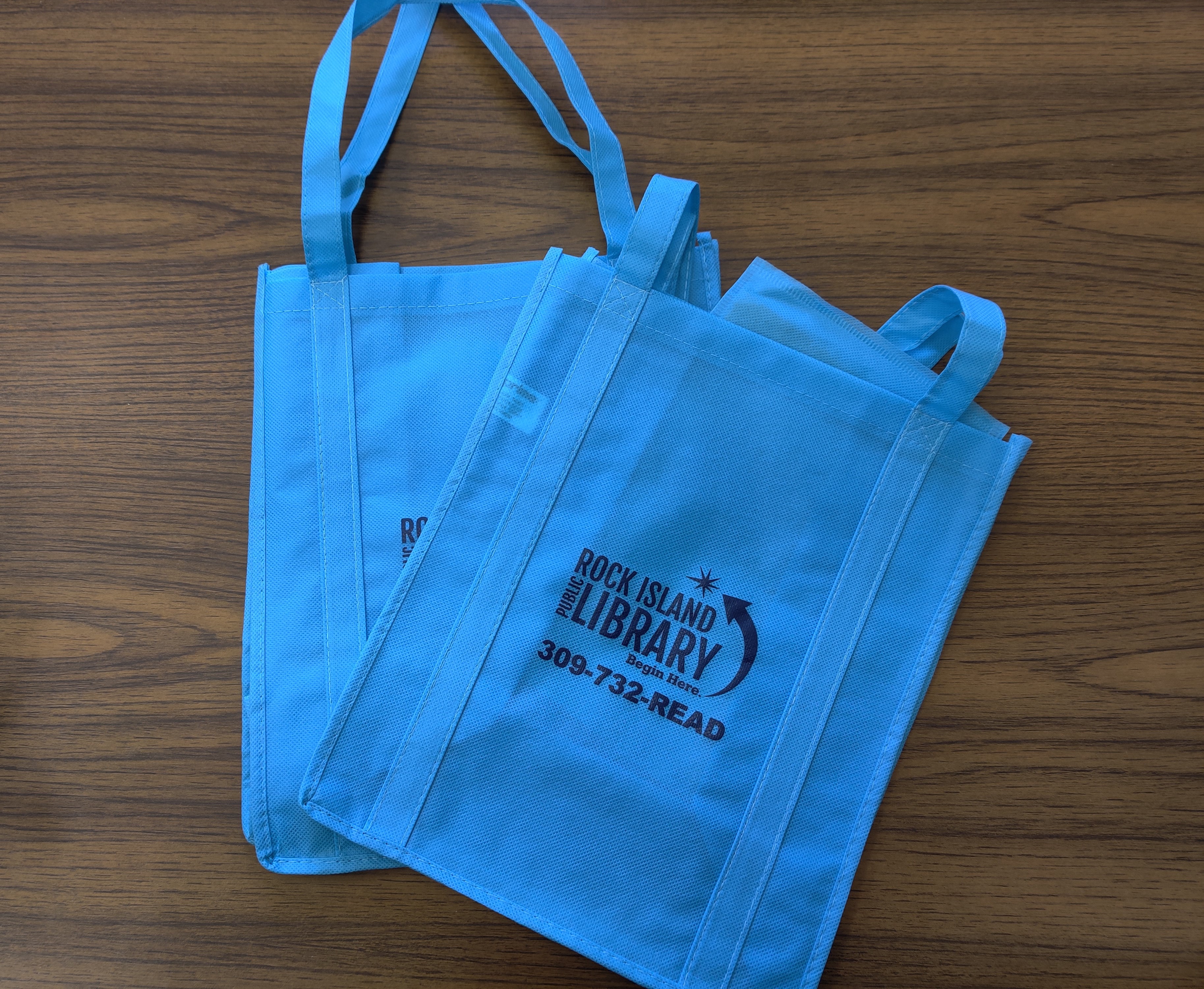 Library bags_light blue with navy blue lettering 