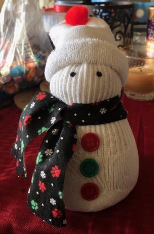 Make a Sock Snowman to bring you cheer throughout the winter!