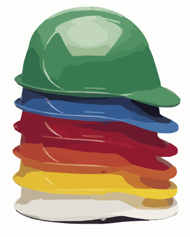 Stack of colorful construction hard hats