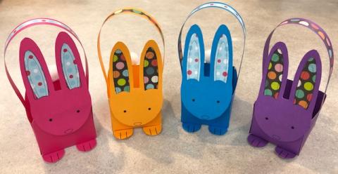 Small paper baskets designed as a Bunny to hold small treats.