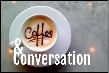 White coffee cup with words coffee and conversation written over image
