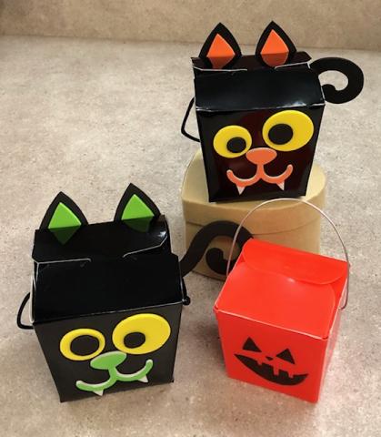 Decorate two cat boxes and a small jack-o-lanter box to fill with treats.