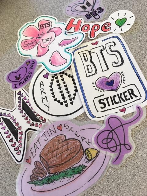 BTS and heart themed hand drawn stickers of various designs.