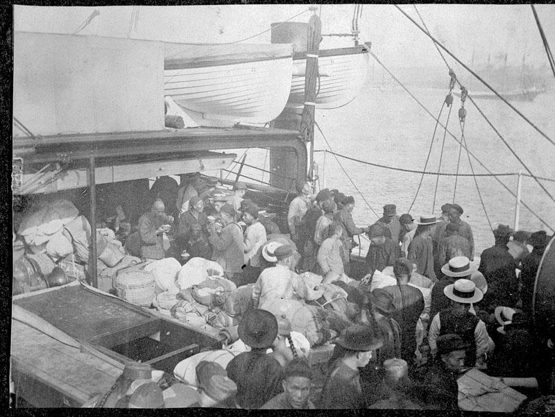 Historic image, Smithsonian Institution, immigrants crowded on deck of ship. Date unknown. 